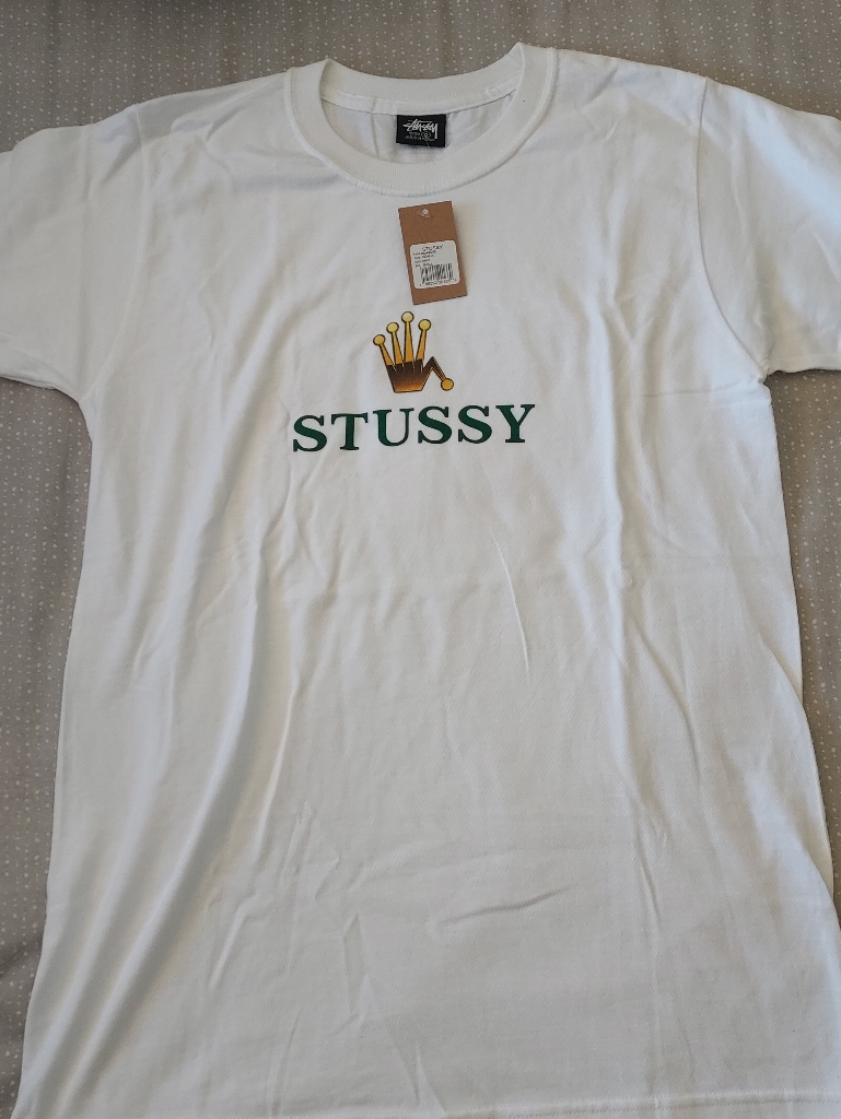 Stussy White Tee With Gold Crown And Green Logo